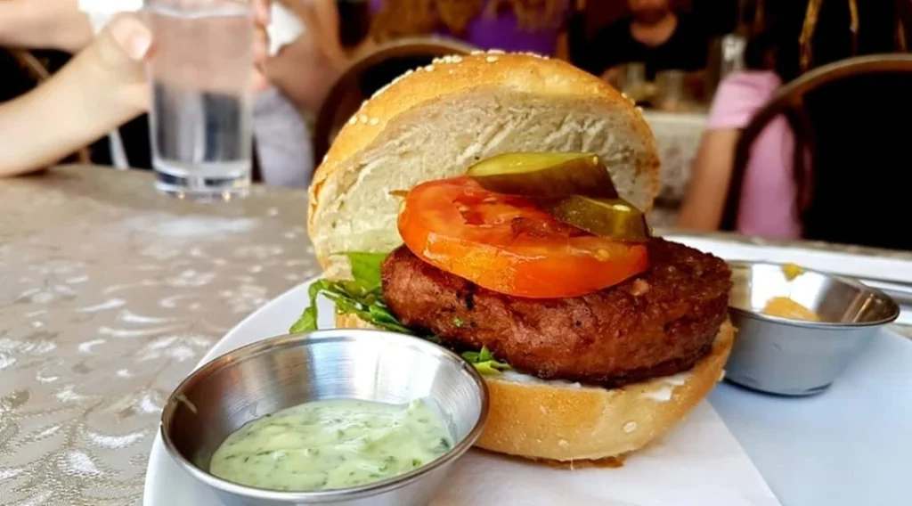 Beyond Meat plant-based burger served in a restaurant setting